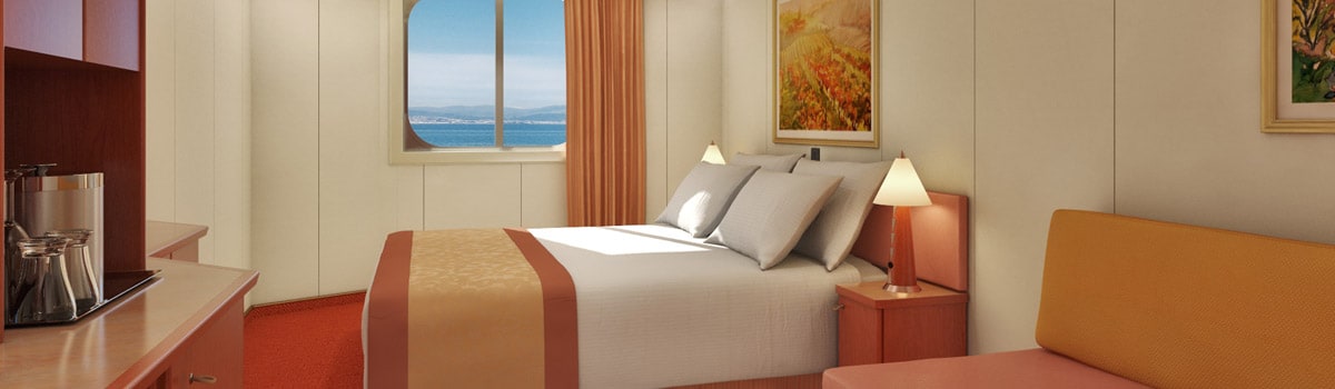 Carnival Conquest Ocean View stateroom — representative Carnival photo