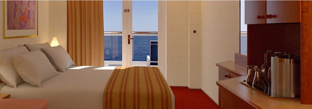 Carnival Pride Balcony stateroom — representative Carnival photo