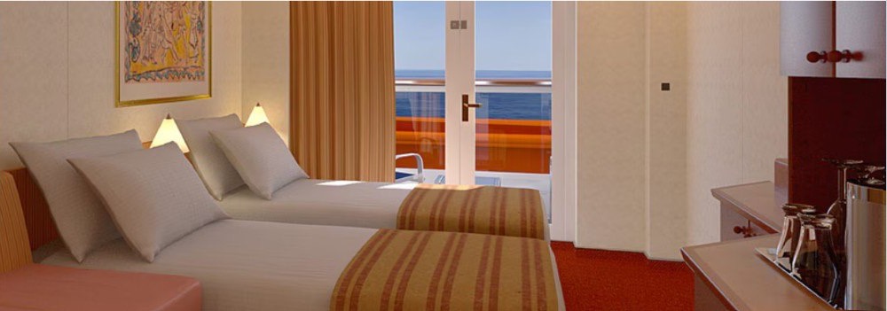 Carnival Pride Obstructed View Balcony stateroom — representative Carnival photo